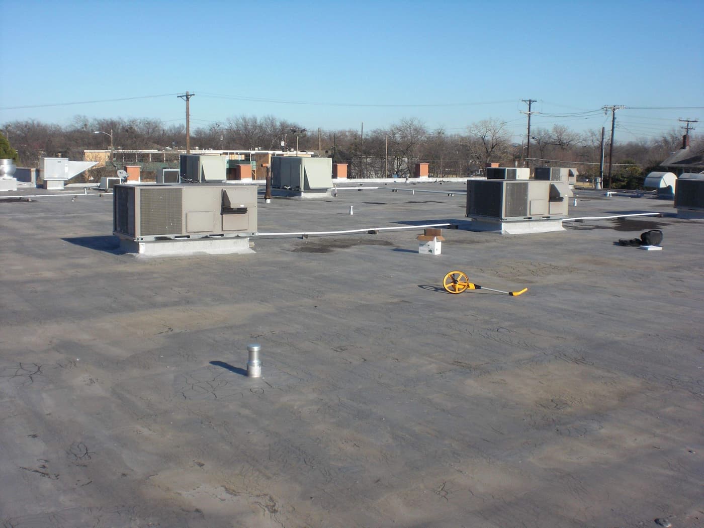 Hail Damage Roof Repair commercial roof planning in New Orleans