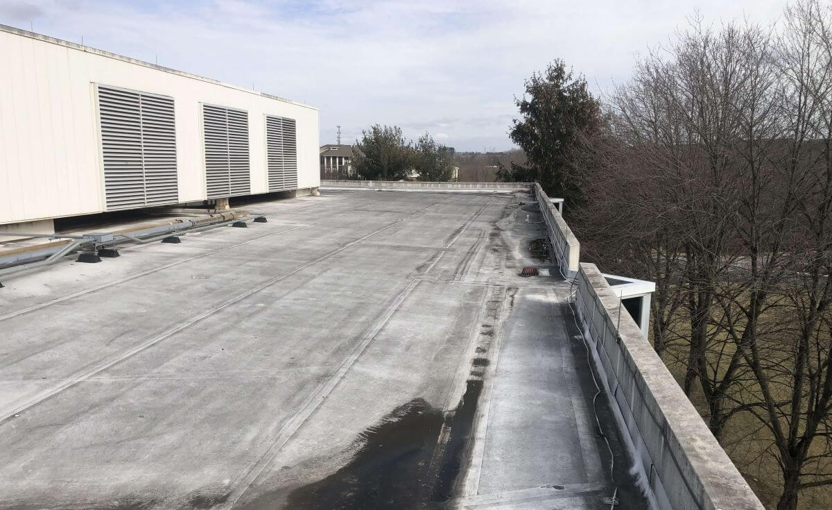 Roof Recover and Overlay commercial roof planning in New Orleans
