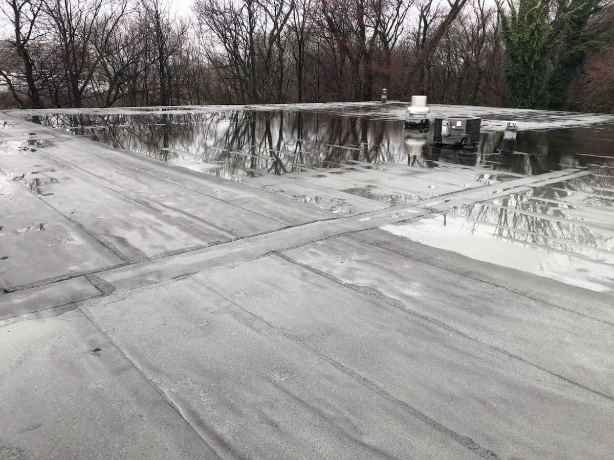 Commercial Roof Coatings — Silicone and SPF/Silicone Hybrid Systems commercial roof planning in New Orleans